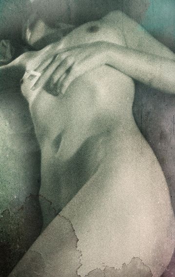 A reclining nude with a hand over her chest, in faded grey-green with stains.