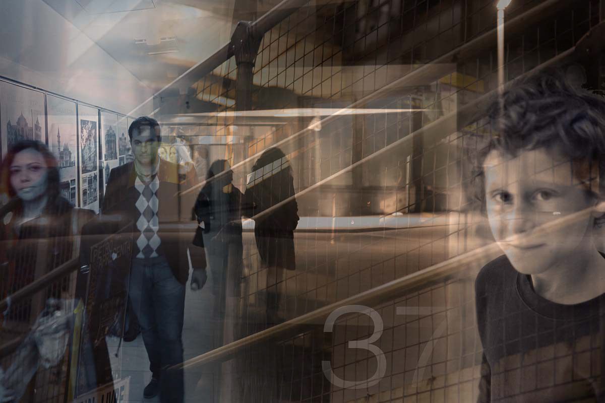 Layered composite of visitors walking through a gallery, a boy's face looking out from the right.