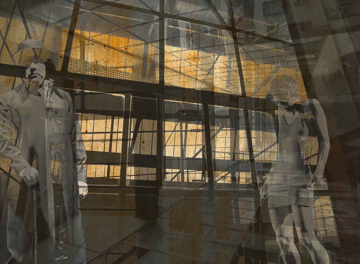 Mannequins and a figure among steel girders and lit windows, in amber and grey.